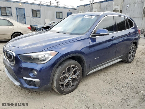 2018 BMW X1 sDrive28i with VIN WBXHU7C32J5H43565, listed as a Copart auction lot 84896014 with 111,925 mi miles and Salvage Title. Bid and sale history available at carsss.com. Image 1.