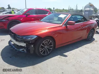 2022 BMW 4 Series 430i with VIN WBA23AT0XNCK07256, listed as a IAAI auction lot 42029209 with 19,238 mi miles. Bid and sale history available at carsss.com. Image 2.