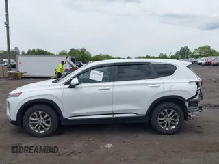 2019 Hyundai Santa Fe SE z VIN 5NMS2CADXKH005960, wystawiony jako IAAI lot #42341142 z przebiegiem 71 617 mil mil oraz . Historia ofert i sprzedaży dostępna na DreamBid. Obrazek 14.