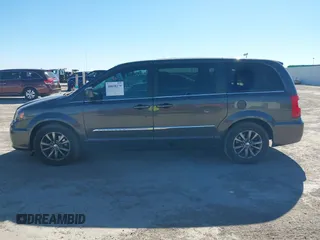 2016 Chrysler Town & Country S with VIN 2C4RC1HG9GR128212, listed as a IAAI auction lot 40858279 with 169,433 mi miles. Bid and sale history available at carsss.com. Image 14.