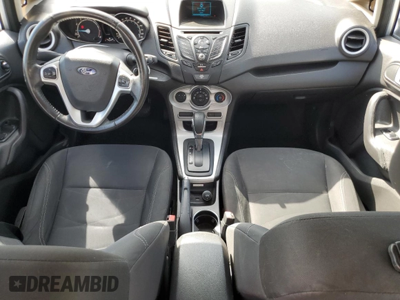 2016 Ford Fiesta SE z VIN 3FADP4BJ3GM142298, wystawiony jako Copart lot #54320835 z przebiegiem 144 636 mil mil oraz Szkoda całkowita • Salvage title. Historia ofert i sprzedaży dostępna na DreamBid. Obrazek 8.