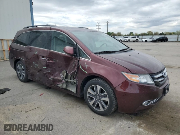 2016 Honda Odyssey Touring Elite with VIN 5FNRL5H96GB125546, listed as a Copart auction lot 54954165 with 101,479 mi miles and Salvage Title. Bid and sale history available at DreamBid. Image 4.