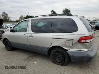 2002 Toyota Sienna LE with VIN 4T3ZF13C72U469151, listed as a Copart auction lot 82419074 with 140,040 mi miles and Salvage Title. Bid and sale history available at carsss.com. Image 2.