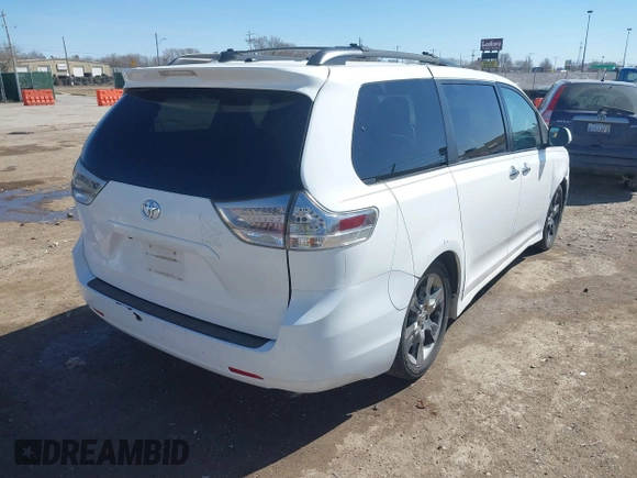 2014 Toyota Sienna SE with VIN 5TDXK3DC0ES477207, listed as a IAAI auction lot 41624619 with 213,881 mi miles and . Bid and sale history available at DreamBid. Image 4.