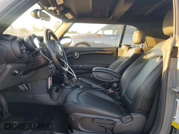 2017 MINI Convertible Cooper with VIN WMWWG5C35H3D00104, listed as a Copart auction lot 80680444 with 33,581 mi miles and Salvage title. Bid and sale history available at DreamBid. Image 7.