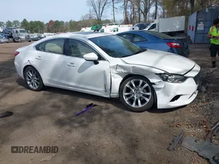 2014 Mazda 6 i Grand Touring с VIN JM1GJ1W61E1117245, выставлен на аукционе IAAI как лот 42093187 с пробегом 109 324 миль миль и . История ставок и продаж доступна на DreamBid. Изображение 1.