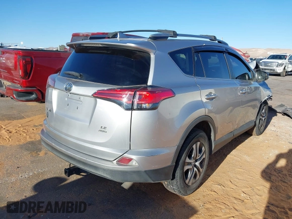 2017 Toyota RAV4 LE with VIN 2T3BFREV2HW672794, listed as a IAAI auction lot 41814820 with 115,721 mi miles and . Bid and sale history available at DreamBid. Image 4.