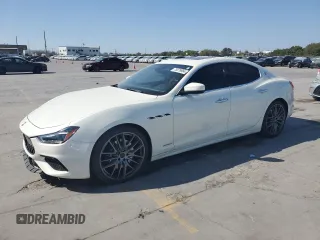 2019 Maserati Ghibli with VIN ZAM57XSS3K1319202, listed as a Copart auction lot 75876964 with 34,486 mi miles and Salvage Title. Bid and sale history available at carsss.com. Image 1.