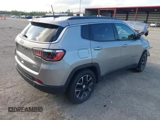 2022 Jeep Compass Latitude with VIN 3C4NJCBB8NT138706, listed as a IAAI auction lot 42503422 with 52,131 mi miles and . Bid and sale history available at DreamBid. Image 4.