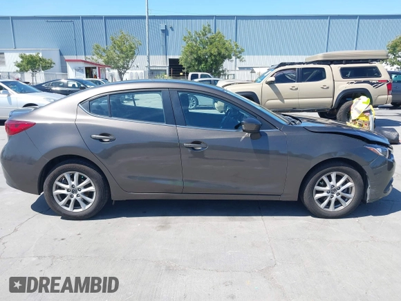 2014 Mazda 3 i Touring z VIN JM1BM1V75E1113050, wystawiony jako IAAI lot #42374782 z przebiegiem 94 571 mil mil oraz . Historia ofert i sprzedaży dostępna na DreamBid. Obrazek 13.