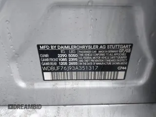 2003 Mercedes-Benz E-Class 5.5L AMG with VIN WDBUF76J93A351317, listed as a IAAI auction lot 41573446 with 144,119 mi miles. Bid and sale history available at carsss.com. Image 9.