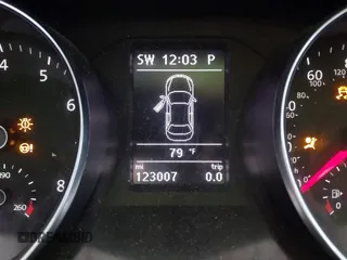 2016 Volkswagen Passat 1.8T SE with VIN 1VWBT7A35GC011129, listed as a IAAI auction lot 39977788 with 123,007 mi miles. Bid and sale history available at carsss.com. Image 7.