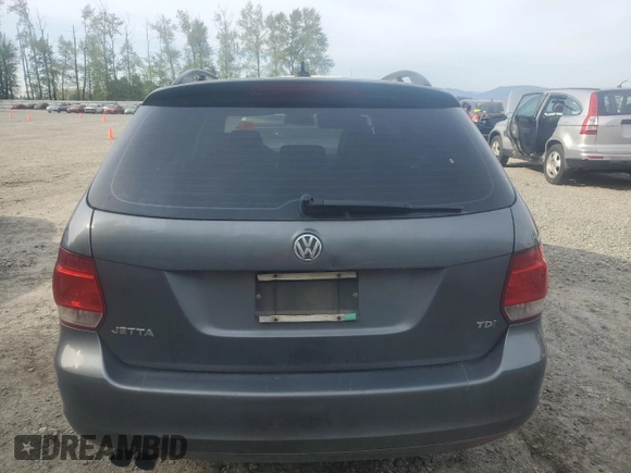 2014 Volkswagen Jetta TDI w/Sunroof with VIN 3VWPL7AJ9EM609093, listed as a Copart auction lot 54745685 with 94,649 mi miles and Salvage title. Bid and sale history available at DreamBid. Image 6.