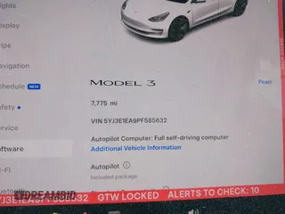 2023 Tesla Model 3 with VIN 5YJ3E1EA9PF585632, listed as a IAAI auction lot 40520993 with 7,775 mi miles and . Bid and sale history available at DreamBid. Image 7.
