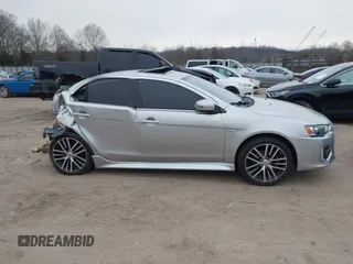 2016 Mitsubishi Lancer GT with VIN JA32U8FW1GU008973, listed as a IAAI auction lot 41293100 with 84,075 mi miles. Bid and sale history available at carsss.com. Image 13.