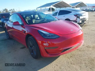 2022 Tesla Model 3 Long Range with VIN 5YJ3E1EB0NF212257, listed as a IAAI auction lot 41735989 with 28,528 mi miles. Bid and sale history available at carsss.com. Image 1.