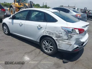 2017 Ford Focus SE with VIN 1FADP3F21HL217838, listed as a IAAI auction lot 42560331 with 154,406 mi miles and . Bid and sale history available at DreamBid. Image 3.