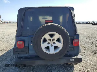 2005 Jeep Wrangler Rubicon with VIN 1J4FA69S05P351725, listed as a Copart auction lot 71411904 with 144,557 mi miles and Salvage Title. Bid and sale history available at carsss.com. Image 6.