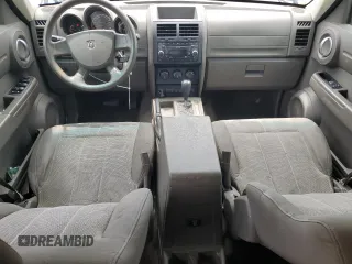 2007 Dodge Nitro SXT z VIN 1D8GT28KX7W596489, wystawiony jako Copart lot #56151355 z przebiegiem 295 949 mil mil oraz Szkoda całkowita • Salvage title. Historia ofert i sprzedaży dostępna na DreamBid. Obrazek 8.