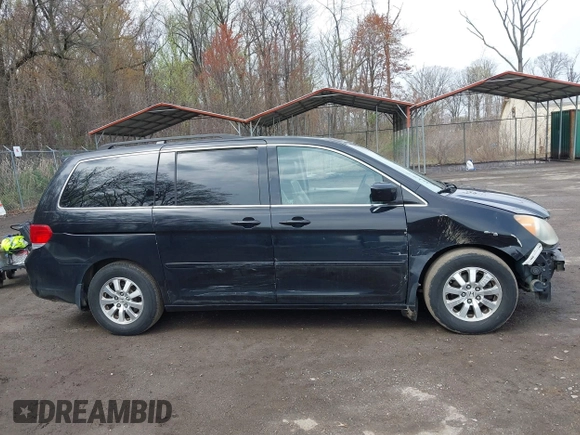 2009 Honda Odyssey EX-L with VIN 5FNRL387X9B051750, listed as a IAAI auction lot 41953221 with 205,142 mi miles. Bid and sale history available at carsss.com. Image 14.