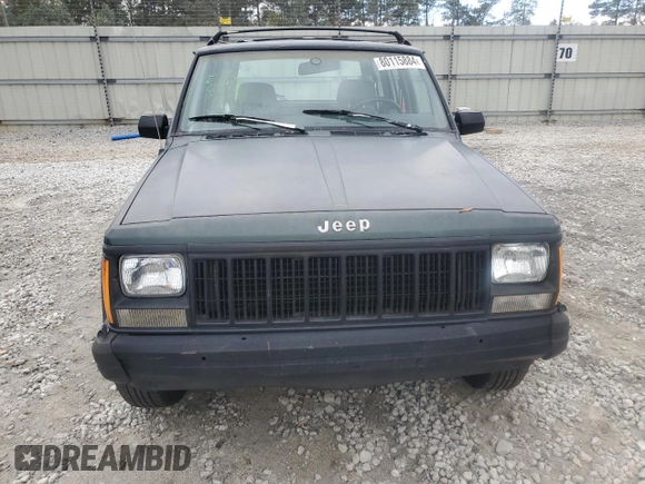 1993 Jeep Cherokee Sport with VIN 1J4FT68S4PL588241, listed as a Copart auction lot 80115884 with 204,174 mi miles and Salvage Title. Bid and sale history available at carsss.com. Image 5.