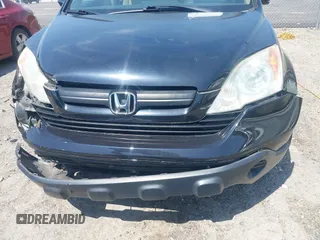 2007 Honda CR-V LX with VIN 5J6RE38377L000654, listed as a IAAI auction lot 42031455 with 112,869 mi miles. Bid and sale history available at carsss.com. Image 13.