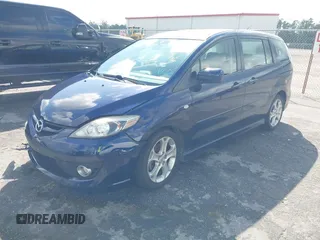 2009 Mazda 5 Sport with VIN JM1CR29L390355978, listed as a IAAI auction lot 41609117 with 118,588 mi miles and . Bid and sale history available at DreamBid. Image 2.
