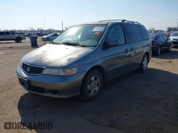 2000 Honda Odyssey EX z VIN 2HKRL187XYH619354, wystawiony jako IAAI lot #41461901 z przebiegiem Nie podano mil oraz . Historia ofert i sprzedaży dostępna na DreamBid. Obrazek 2.