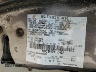 2007 Ford Focus S z VIN 1FAHP34N17W103625, wystawiony jako Copart lot #55300395 z przebiegiem 82 041 mil mil oraz Szkoda całkowita • Salvage title. Historia ofert i sprzedaży dostępna na DreamBid. Obrazek 12.