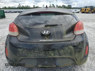 2014 Hyundai Veloster z VIN KMHTC6AD3EU198500, wystawiony jako Copart lot #56943915 z przebiegiem 118 173 mil mil oraz Tytuł czysty. Historia ofert i sprzedaży dostępna na DreamBid. Obrazek 6.