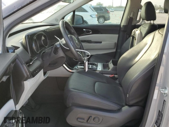 2022 Kia Carnival EX with VIN KNDNC5H38N6147034, listed as a Copart auction lot 86811174 with 22,580 mi miles and Salvage Title. Bid and sale history available at carsss.com. Image 7.
