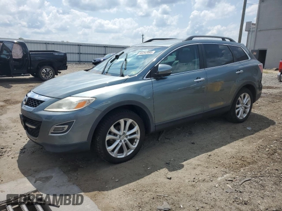 2012 Mazda CX-9 Grand Touring with VIN JM3TB2DVXC0361644, listed as a Copart auction lot 66092895 with 121,021 mi miles and Clean title. Bid and sale history available at DreamBid. Image 1.