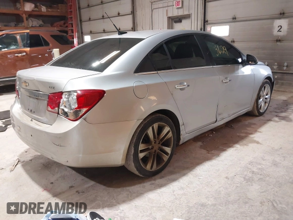 2011 Chevrolet Cruze LTZ with VIN 1G1PH5S98B7144253, listed as a IAAI auction lot 41753692 with 208,873 mi miles and . Bid and sale history available at DreamBid. Image 4.