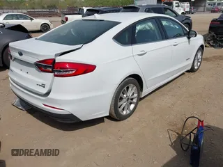 2019 Ford Fusion Hybrid SE with VIN 3FA6P0LU6KR267365, listed as a IAAI auction lot 42030525 with 95,401 mi miles. Bid and sale history available at carsss.com. Image 4.