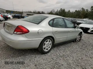 2005 Ford Taurus SE with VIN 1FAFP53U35A162987, listed as a Copart auction lot 49863695 with 156,917 mi miles and Salvage Title. Bid and sale history available at carsss.com. Image 3.