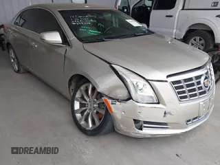 2015 Cadillac XTS Luxury z VIN 2G61M5S39F9246298, wystawiony jako IAAI lot #41555093 z przebiegiem 126 928 mil mil oraz . Historia ofert i sprzedaży dostępna na DreamBid. Obrazek 6.