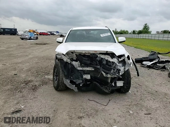 2019 Toyota Tacoma SR z VIN 3TMCZ5AN5KM242521, wystawiony jako Copart lot #55167485 z przebiegiem Nie podano mil oraz Szkoda całkowita • Salvage title. Historia ofert i sprzedaży dostępna na DreamBid. Obrazek 13.