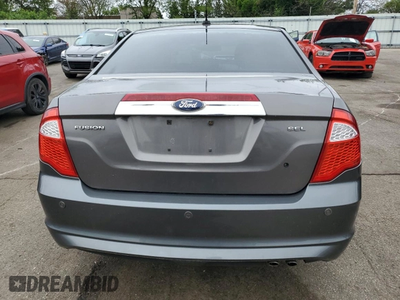 2012 Ford Fusion SEL z VIN 3FAHP0JA2CR232860, wystawiony jako Copart lot #57754735 z przebiegiem 234 638 mil mil oraz Szkody całkowita. Historia ofert i sprzedaży dostępna na DreamBid. Obrazek 6.