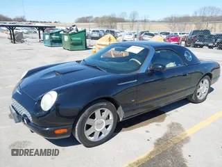 2004 Ford Thunderbird Deluxe z VIN 1FAHP60AX4Y103613, wystawiony jako IAAI lot #41962198 z przebiegiem 81 765 mil mil oraz . Historia ofert i sprzedaży dostępna na DreamBid. Obrazek 2.