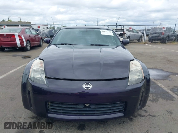 2005 Nissan 350Z Enthusiast z VIN JN1AZ34D25M605438, wystawiony jako IAAI lot #42131179 z przebiegiem 143 157 mil mil oraz . Historia ofert i sprzedaży dostępna na DreamBid. Obrazek 12.