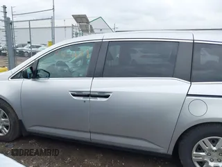 2011 Honda Odyssey LX with VIN 5FNRL5H25BB040287, listed as a IAAI auction lot 42456679 with 129,176 mi miles and . Bid and sale history available at DreamBid. Image 14.