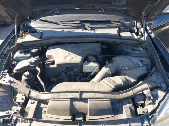 2014 BMW X1 xDrive28i with VIN WBAVL1C58EVY11143, listed as a IAAI auction lot 41396236 with 115,667 mi miles. Bid and sale history available at carsss.com. Image 10.