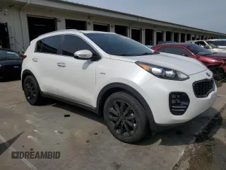 2019 Kia Sportage EX z VIN KNDPNCAC7K7522953, wystawiony jako Copart lot #54906835 z przebiegiem 128 011 mil mil oraz Szkoda całkowita • Salvage title. Historia ofert i sprzedaży dostępna na DreamBid. Obrazek 4.