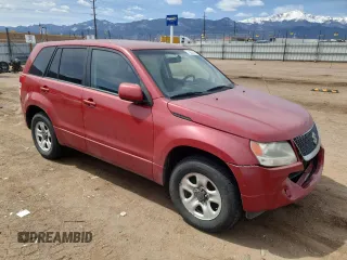 2012 Suzuki Grand Vitara Premium z VIN JS3TD0D20C4101342, wystawiony jako Copart lot #51956595 z przebiegiem 166 710 mil mil oraz Szkody całkowita. Historia ofert i sprzedaży dostępna na DreamBid. Obrazek 4.