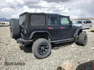 2010 Jeep Wrangler Unlimited Sahara with VIN 1J4HA5H13AL182071, listed as a Copart auction lot 51696665 with 178,026 mi miles and Salvage Title. Bid and sale history available at carsss.com. Image 3.