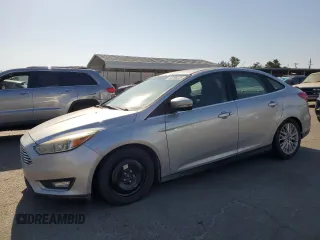 2015 Ford Focus Titanium с VIN 1FADP3J29FL269772, выставлен на аукционе Copart как лот 63290225 с пробегом 114 374 миль миль и Списание • Salvage title. История ставок и продаж доступна на DreamBid. Изображение 1.