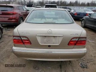 2002 Mercedes-Benz E-Class with VIN WDBJF82J52X062915, listed as a Copart auction lot 48284604 with 150,227 mi miles and Salvage Title. Bid and sale history available at carsss.com. Image 6.