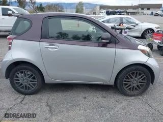 2014 Scion iQ with VIN JTNJJXB01EJ028930, listed as a IAAI auction lot 41771879 with 113,364 mi miles. Bid and sale history available at carsss.com. Image 13.