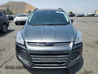 2014 Ford Escape SE z VIN 1FMCU0GX0EUE27453, wystawiony jako Copart lot #59437875 z przebiegiem 154 177 mil mil oraz Czysty tytuł • Clean title. Historia ofert i sprzedaży dostępna na DreamBid. Obrazek 5.