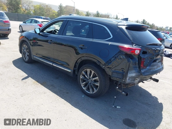 2016 Mazda CX-9 Grand Touring with VIN JM3TCBDY4G0113693, listed as a IAAI auction lot 41965857 with 152,403 mi miles and . Bid and sale history available at DreamBid. Image 3.
